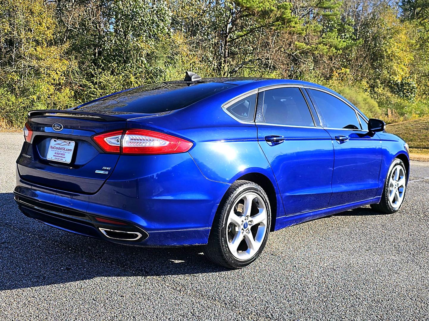 2015 Blue Ford Fusion SE (3FA6P0T96FR) with an 2.0L L4 DOHC 16V engine, Automatic transmission, located at 18001 Kellogg Rd, Saucier, MS, 39574, (228) 832-1441, 39.421459, -76.641457 - Photo#5